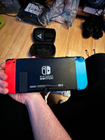 Nintendo Switch 32GB Handheld Console - Neon Red/Neon Blue and Extra A