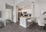Modern kitchen in luxury apartment with new cabinetry and spacious layout at Lakeview at Palm Harbor.