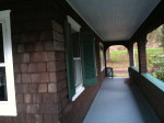 Shingle Style Home with Large Wraparound Porch