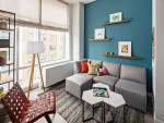 Stylish living area in AVA DoBro, featuring modern furnishings and vibrant decor in Brooklyn apartments.