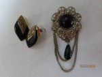 Black brooch and earrings