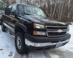 2006 Chevrolet Silverado 1500 in black with low mileage, well-maintained, and rust-free from Oregon.