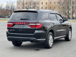 2016 Dodge Durango SXT RWD, black SUV parked, showcasing clean exterior and design.