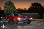 1985 Mercedes 380SL in red parked with new tires and excellent condition under evening sky