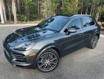 2019 Porsche Cayenne S AWD in Mahogany Metallic parked outdoors with modern styling.