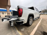 2020 GMC Sierra 1500 Denali 4WD with clean title, well-maintained, showing rear and side view.