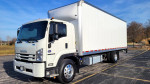 2021 Isuzu FTR 26ft box truck with liftgate, featuring a white cab and box, parked in a lot.