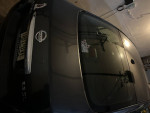 2012 Nissan Altima SL in good condition with 122k miles, featuring new brakes and tires, parked indoors.