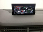2019 Audi Q7 interior with navigation system displayed on the dashboard