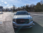 Front view of a 2017 GMC Yukon XL for sale, well-maintained with 154K miles and clean title.