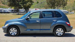 2006 Chrysler PT Cruiser wagon in blue with gray interior, 147,412 miles, automatic transmission, front-wheel drive.