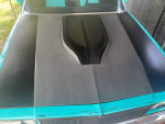 Close-up of 1978 Chevrolet Malibu custom hood with unique teal and black finish