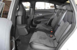Interior view of a 2022 Audi e-tron GT Premium Plus with elegant black and grey seating.