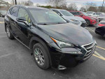 2016 Lexus NX 200t F SPORT SUV in black with keyless entry and Bluetooth, parked among other vehicles