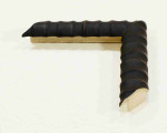 Unusual embossed wooden frame in black, 1.1 inches wide, 0.9 inches high.