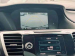Interior view of 2013 Honda Accord EX-L V-6 showing backup camera display and audio controls.