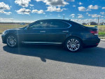Side view of a 2013 Lexus LS 460 L, showcasing its sleek design and premium features.