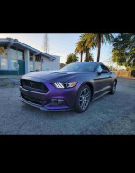 2015 Ford Mustang EcoBoost Premium in purple, showcasing sleek design and clean title with 136K miles.