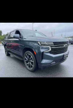 2021 Chevrolet Suburban RST full-size SUV in gray with black accents and 22-inch wheels