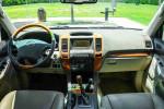 Interior view of a 2007 Lexus GX 470 showcasing the dashboard, steering wheel, and luxurious leather upholstery.