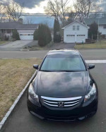2012 Honda Accord EX-L parked in front of a residential area, clean and in great condition for sale.