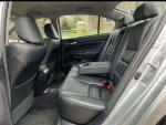 Interior view of a 2012 Honda Accord EX V-6 with black leather seats, clean and spacious.