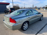 2006 Volvo S60 in silver color, rust-free exterior, featuring clean leather interior and alloy wheels.