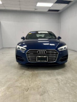 2018 Audi A5 Premium Plus in scuba blue metallic, showcasing a sleek design and exceptional condition