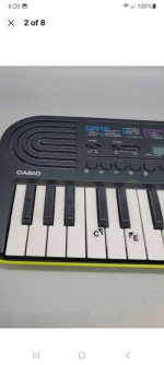 CASIO SA-46 Mini Keyboard Black & Green 32 Keys 100 Tones 50 Patterns