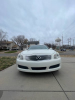 Front view of a 2009 Infiniti G37 in excellent condition, recently serviced with new engine and 142,000 miles.
