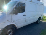 2006 Dodge Sprinter 2500 high ceiling van with rust and diesel engine, ideal for projects or repairs.