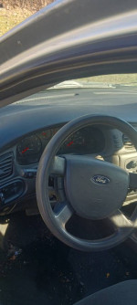 Interior view of a 2008 Ford Taurus SEL with dashboard and steering wheel details