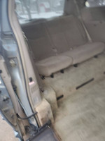 Interior of a BraunAbility side entry van with removable front seats for wheelchair access.