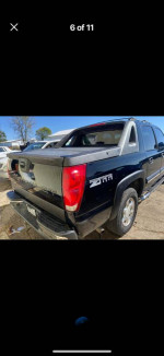 2003 Chevrolet Avalanche truck with clean interior and minor rust, for sale in good running condition