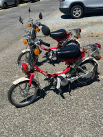 Two Yamaha QT50 Yamahoppers