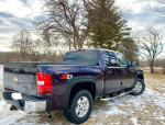 2008 Chevrolet Silverado LTZ 4WD truck with low mileage parked in a scenic outdoor setting
