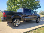 2007 Ford F-150 Harley-Davidson in dark amethyst color parked outdoors with black leather interior