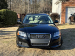 Front view of a black 2009 Audi A3 Quattro hatchback for sale with low mileage and turbo engine.