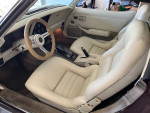 Interior view of a 1980 Chevrolet Corvette showcasing comfortable leather seats and stylish dashboard.