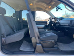 Interior view of a well-maintained 2007 GMC Sierra Extended Cab with spacious seating and modern features.