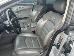 Interior view of a 2006 Mercedes CLS55 showing gray leather seats and dashboard