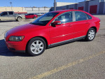 2007 Volvo S40 2.4i sedan in red color, 124,000 miles, clean title, 5-speed manual transmission