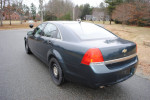 Rear view of a 2014 Chevrolet Caprice PPV police vehicle with low mileage, featuring a sleek design.