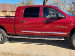 2006 Dodge Ram 2500 4X4 mega cab in red, fully loaded with Cummins diesel engine and leather seats