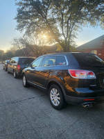 2007 Mazda CX-9 Sport SUV parked on a street, showcasing its sleek design and mechanical condition.