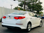 2015 Kia Optima LX FWD in white, 97,000 miles, showcasing alloy wheels and clean exterior.