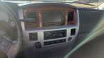 Interior view of a 2007 Dodge Ram 3500 Mega Cab with navigation and climate controls.