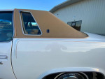 Close-up view of the unique roof design of a 1977 Cutlass Supreme in mint condition.