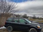 2003 Honda Pilot with leather interior and new tires, parked in Wallkill NY, featuring 4x4 functionality.
