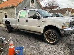 2004 Ford F350 diesel truck, crew cab, white with rust, automatic, 4x4, parked outside